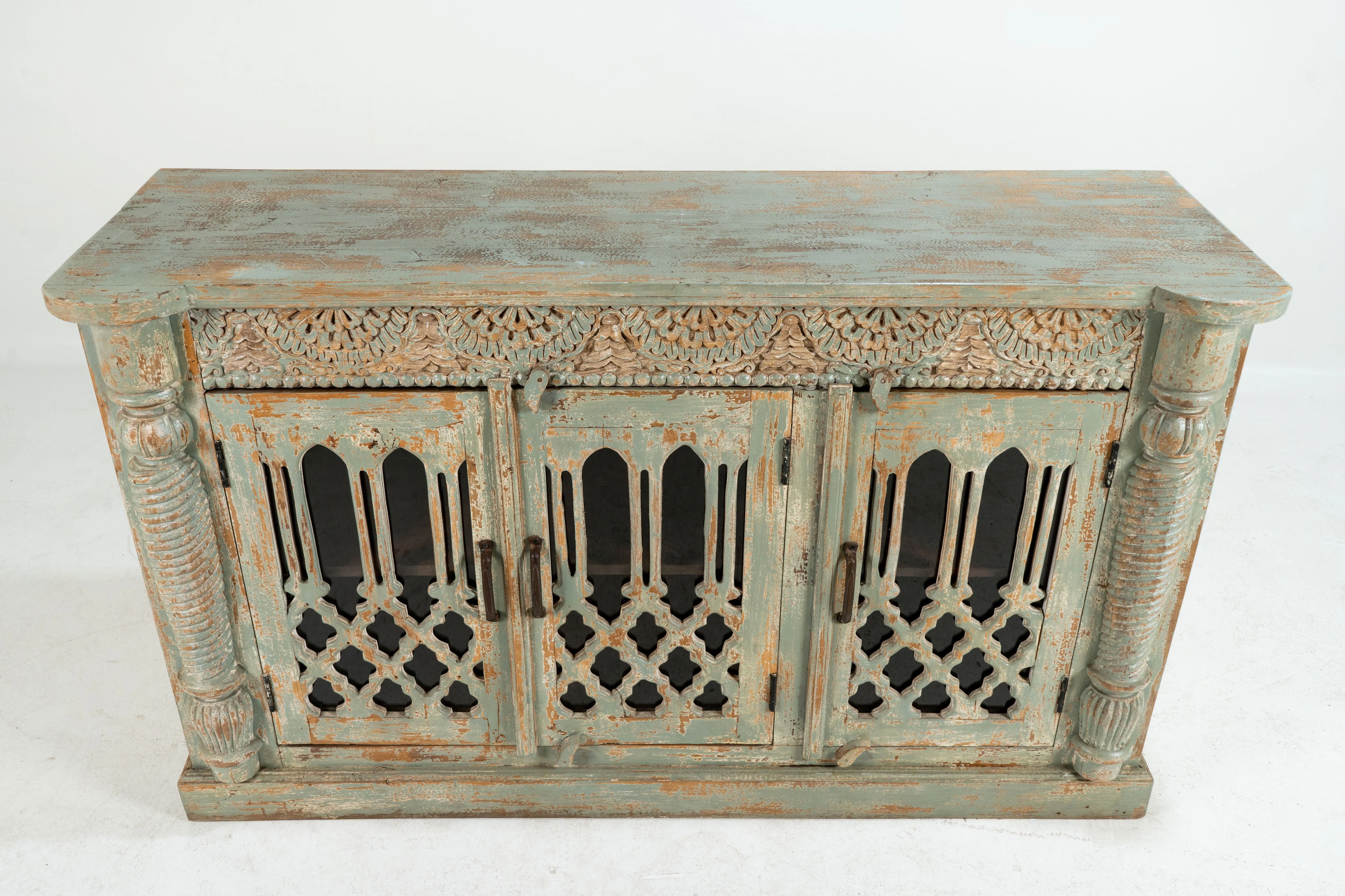 A Wooden Sideboard with Wooden Openwork Doors