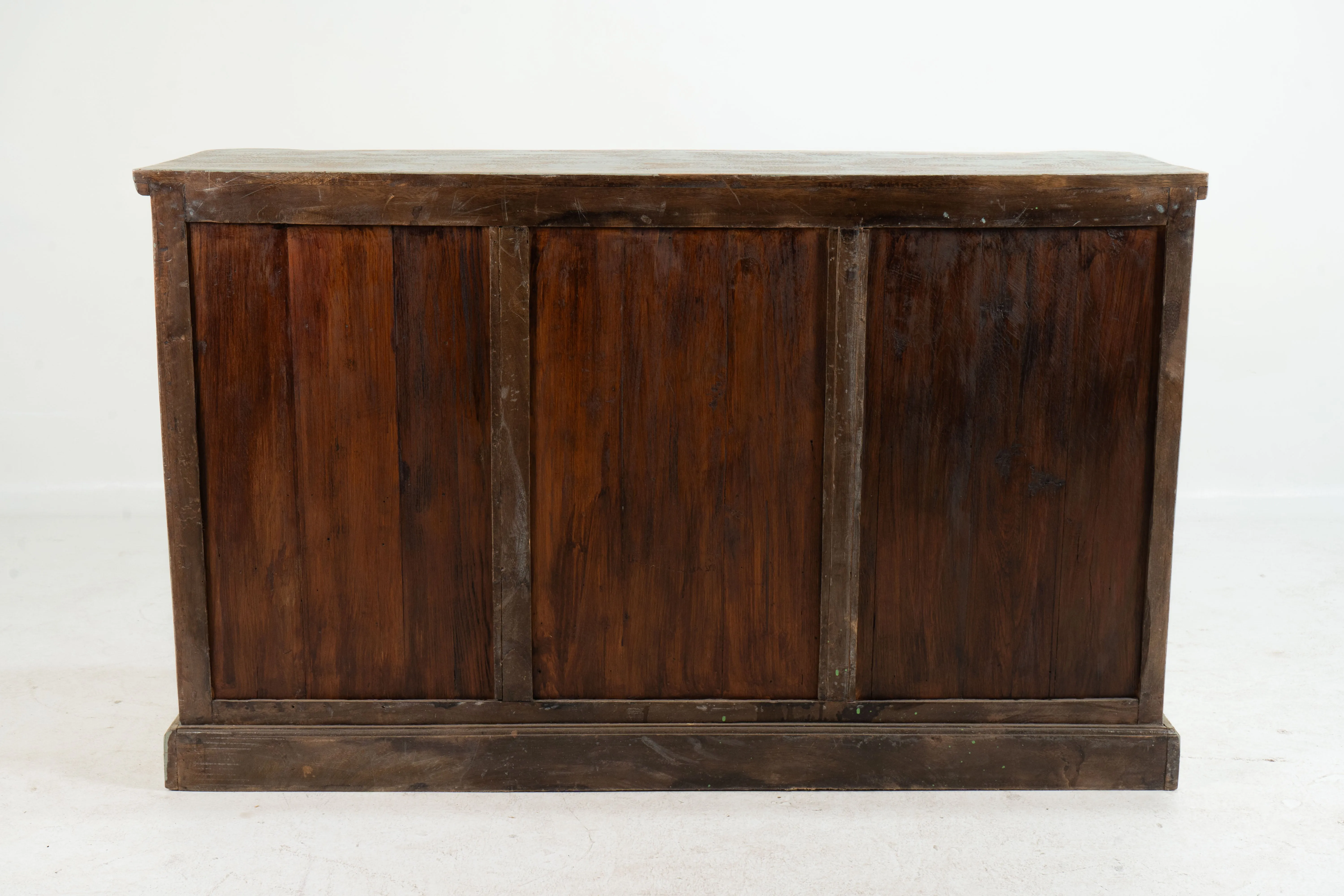 A Wooden Sideboard with Wooden Openwork Doors