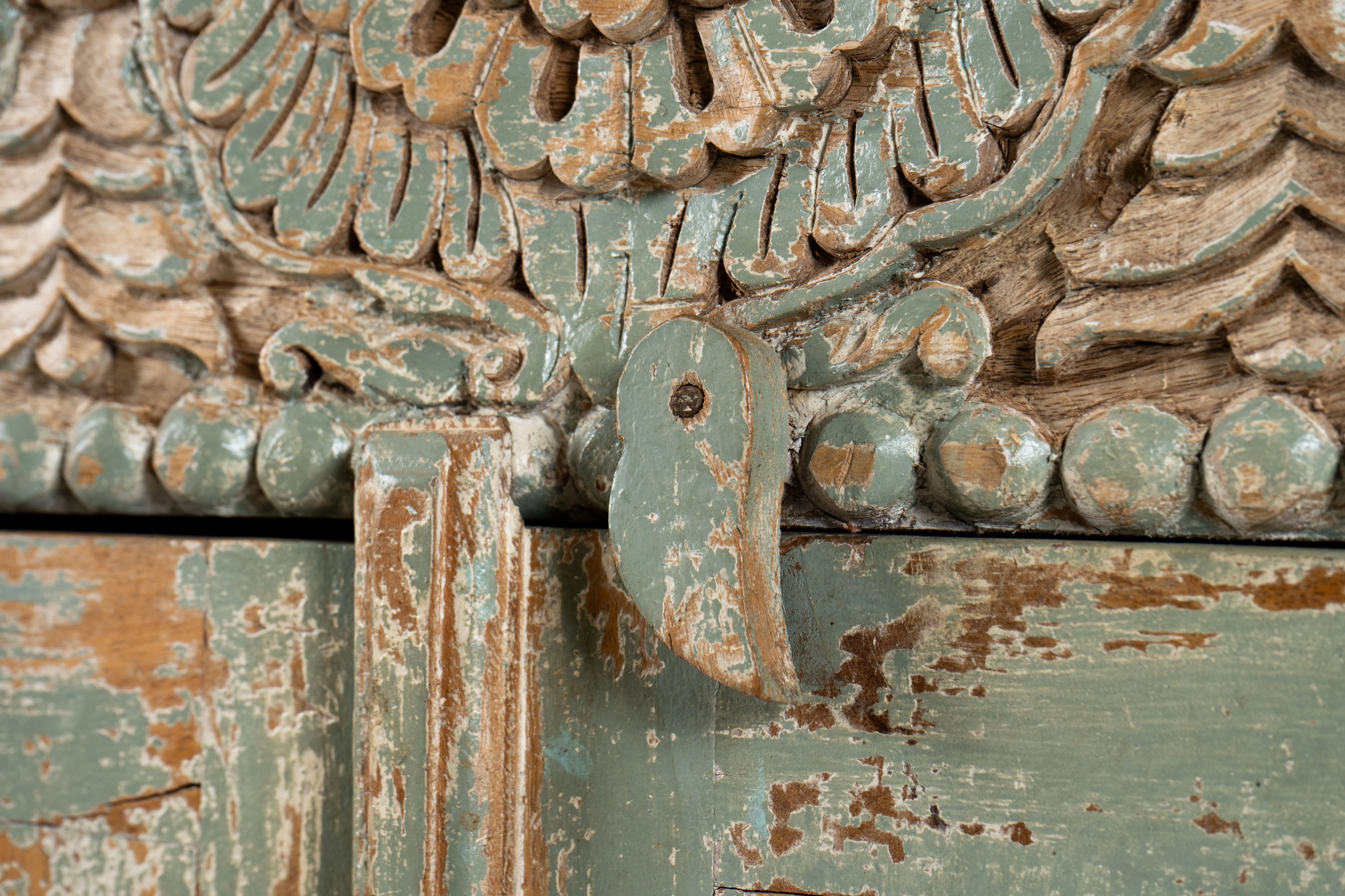 A Wooden Sideboard with Wooden Openwork Doors