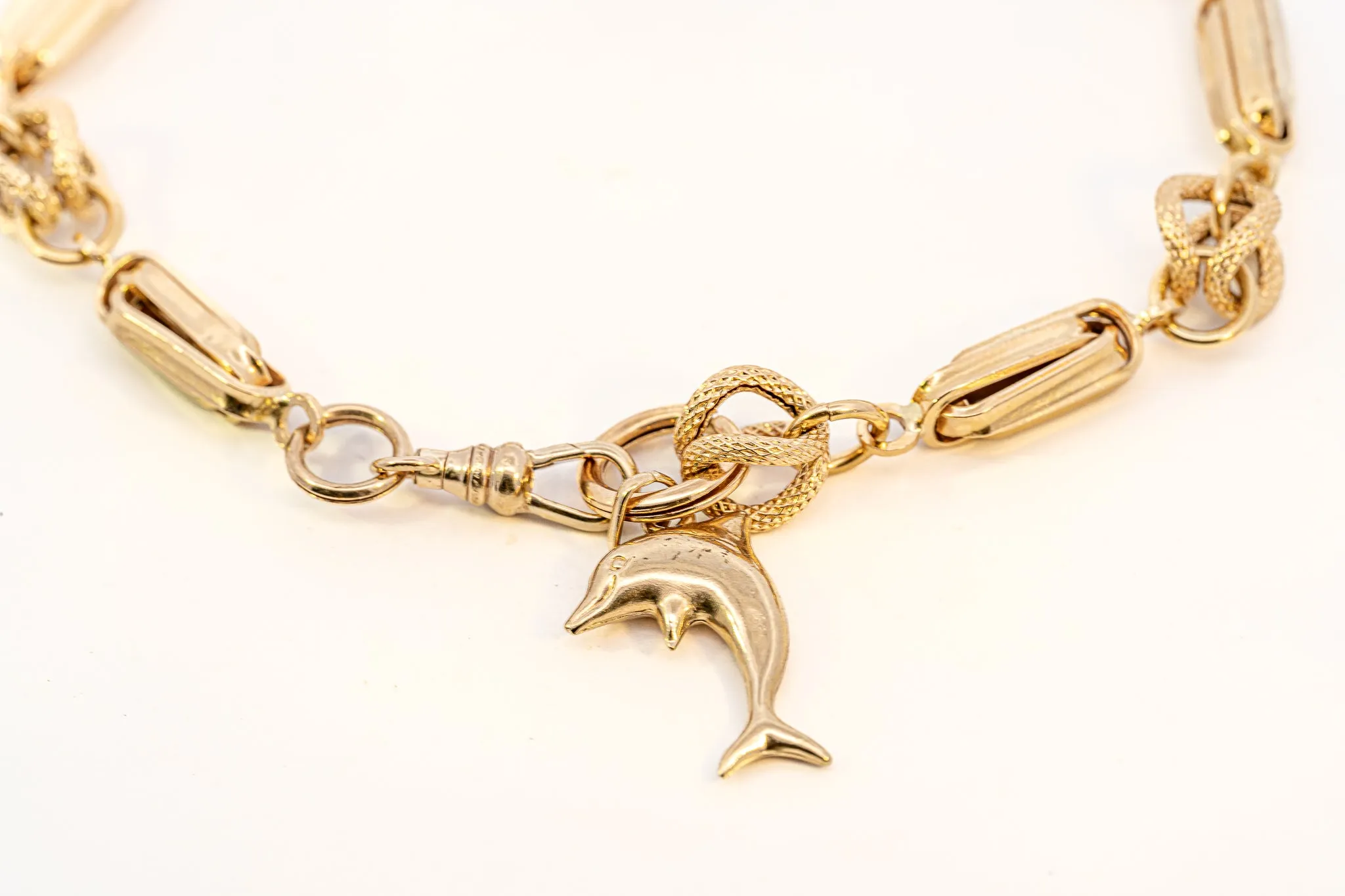 An Exquisite Gold Bracelet with Dolphin Charm, that's Beyond Ordinary!
