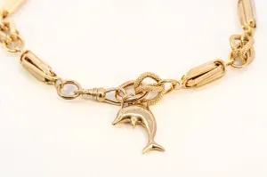 An Exquisite Gold Bracelet with Dolphin Charm, that's Beyond Ordinary!