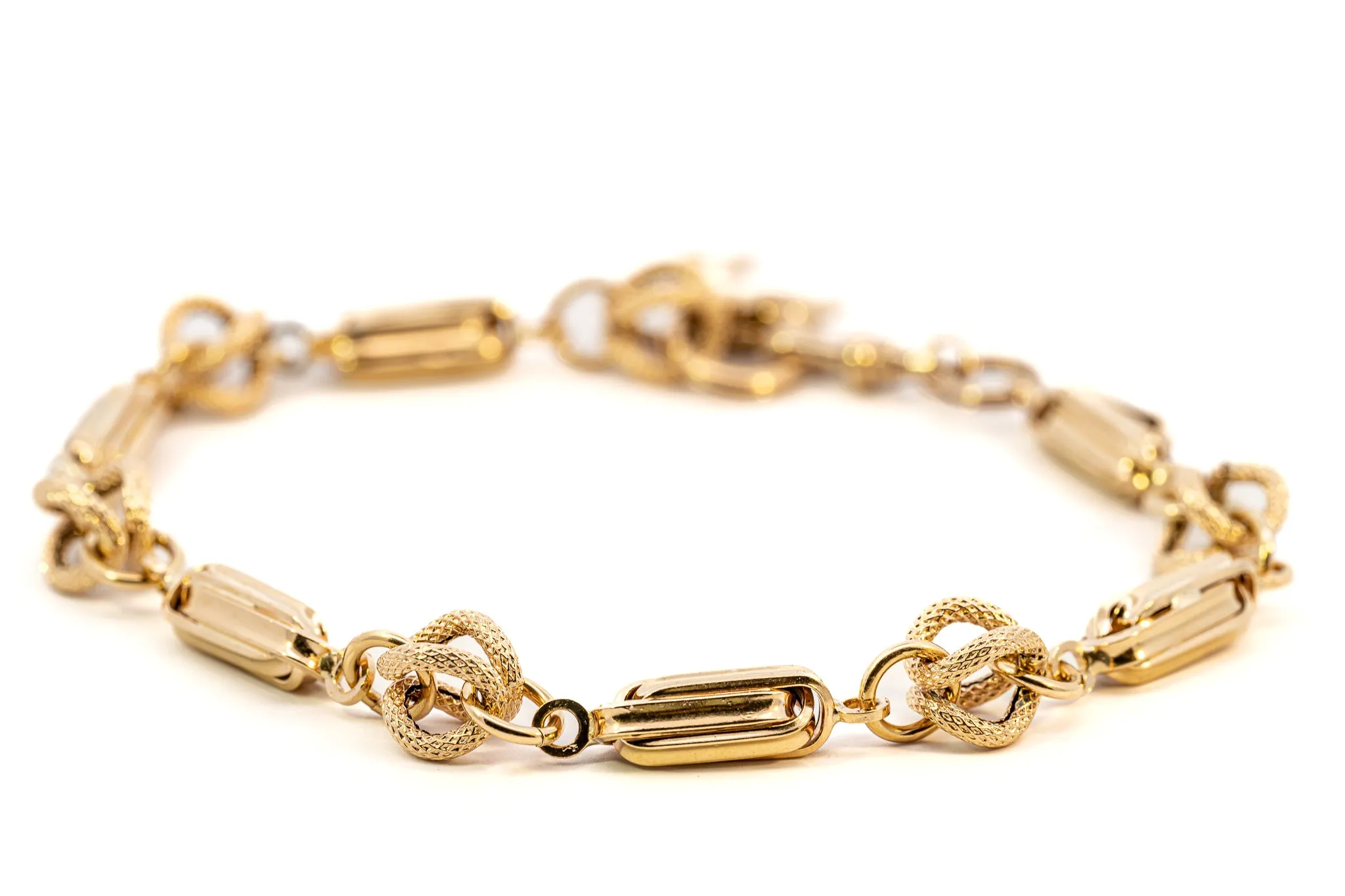 An Exquisite Gold Bracelet with Dolphin Charm, that's Beyond Ordinary!