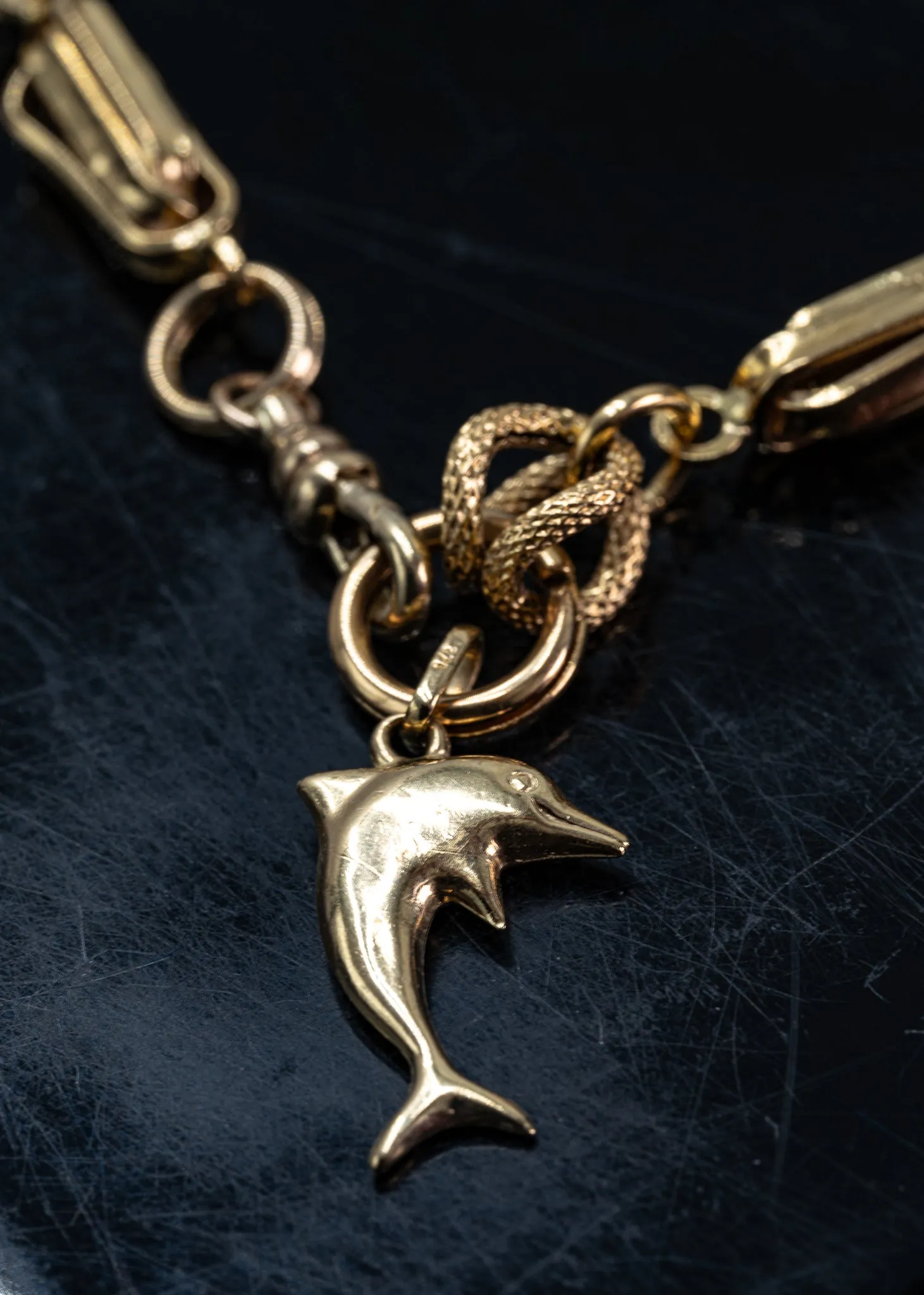An Exquisite Gold Bracelet with Dolphin Charm, that's Beyond Ordinary!