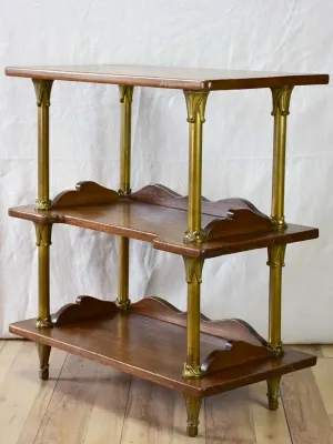 Early twentieth century shelving unit with bronze frame from a boutique 32¼"