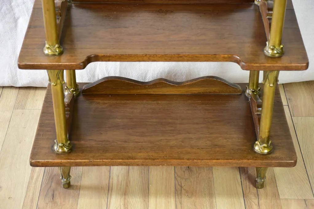 Early twentieth century shelving unit with bronze frame from a boutique 32¼"