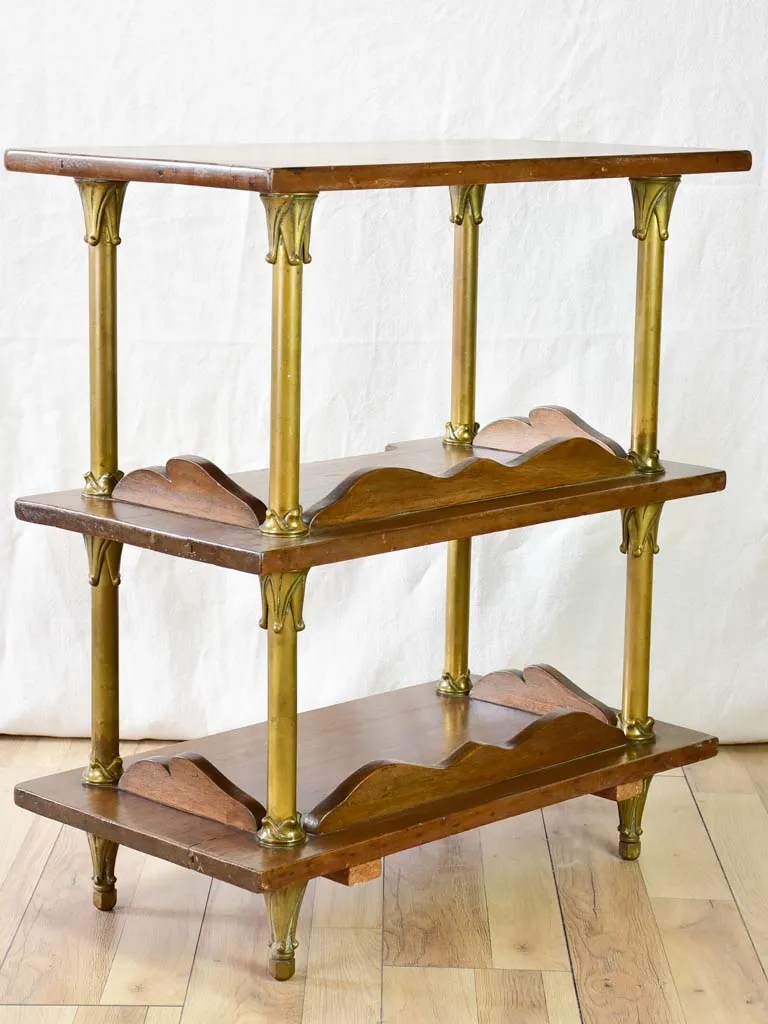Early twentieth century shelving unit with bronze frame from a boutique 32¼"
