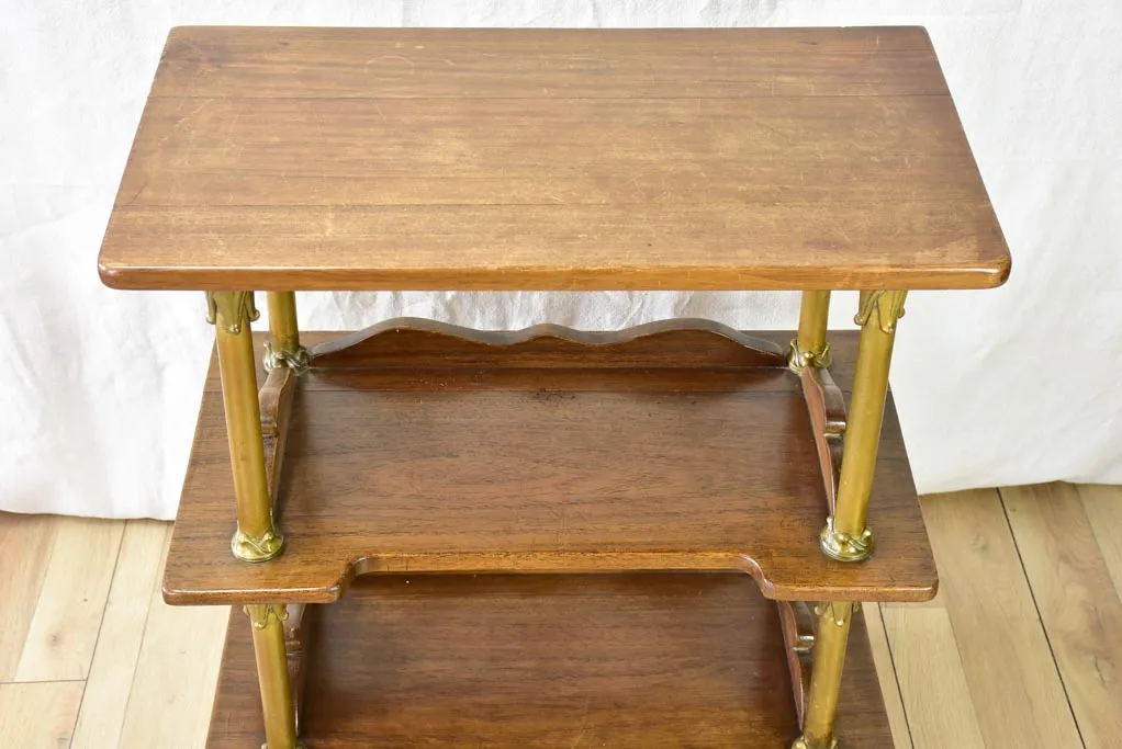 Early twentieth century shelving unit with bronze frame from a boutique 32¼"