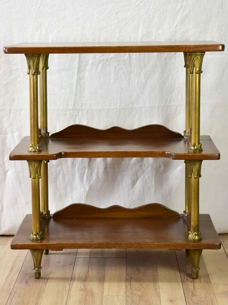 Early twentieth century shelving unit with bronze frame from a boutique 32¼"