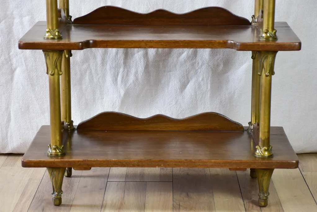 Early twentieth century shelving unit with bronze frame from a boutique 32¼"