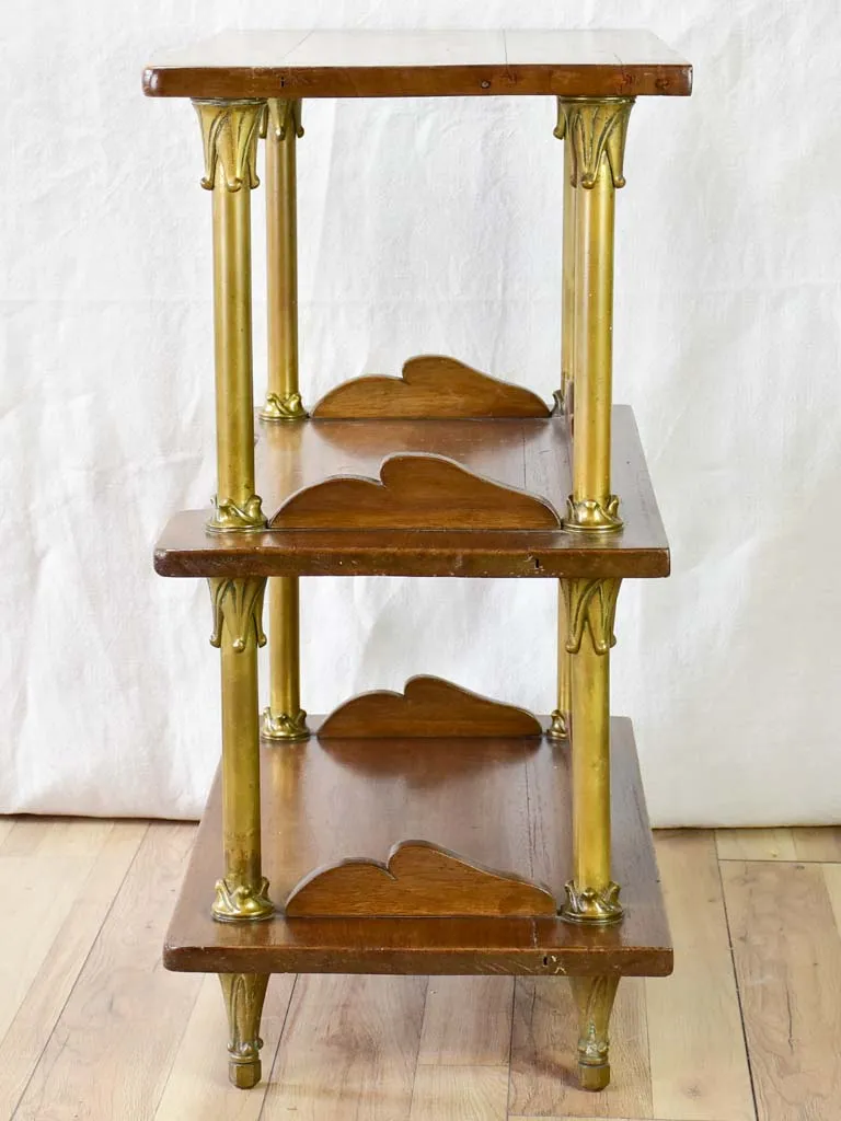 Early twentieth century shelving unit with bronze frame from a boutique 32¼"