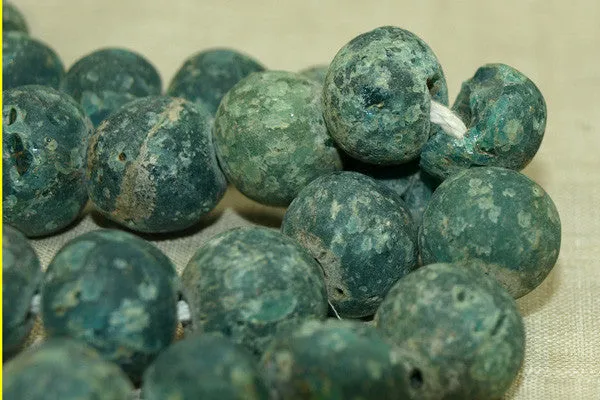 Strand of Rare small Mottled dark Teal Majapahit Beads