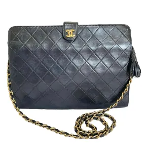 Vintage CHANEL black leather diary book design 2.55 flap shoulder bag with gold tone CC closure. 0407232