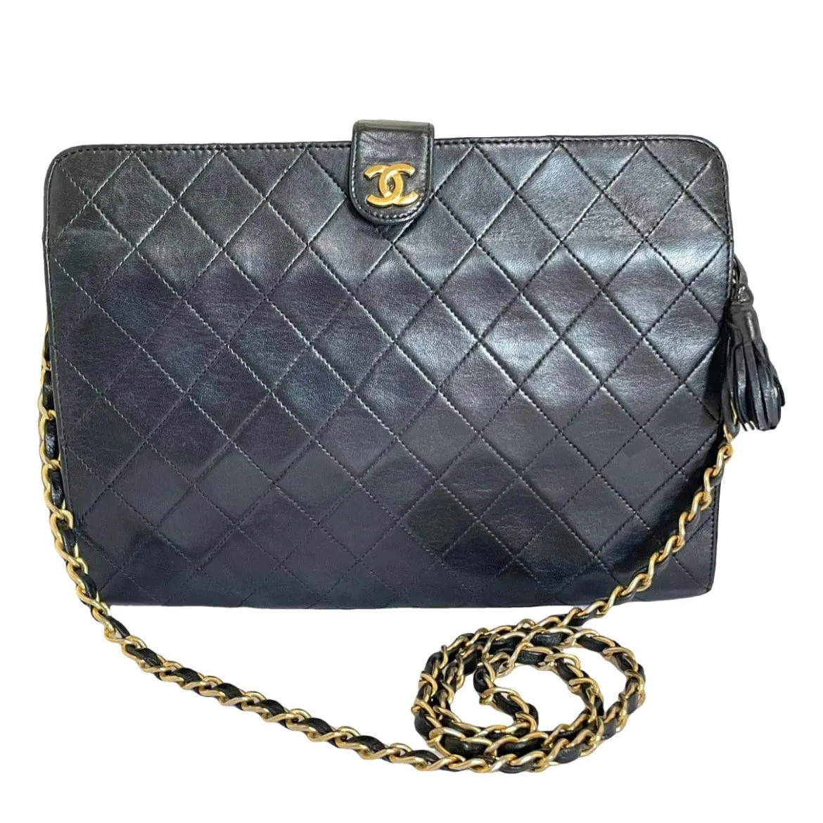 Vintage CHANEL black leather diary book design 2.55 flap shoulder bag with gold tone CC closure. 0407232